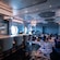The interior of Nightingale’s reveals an elegant piano lounge with a bar, cushioned seating and port hole windows